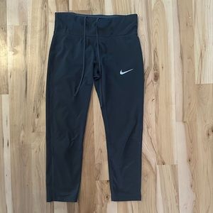 Nike women’s running tight with drawstring. Size S. Black